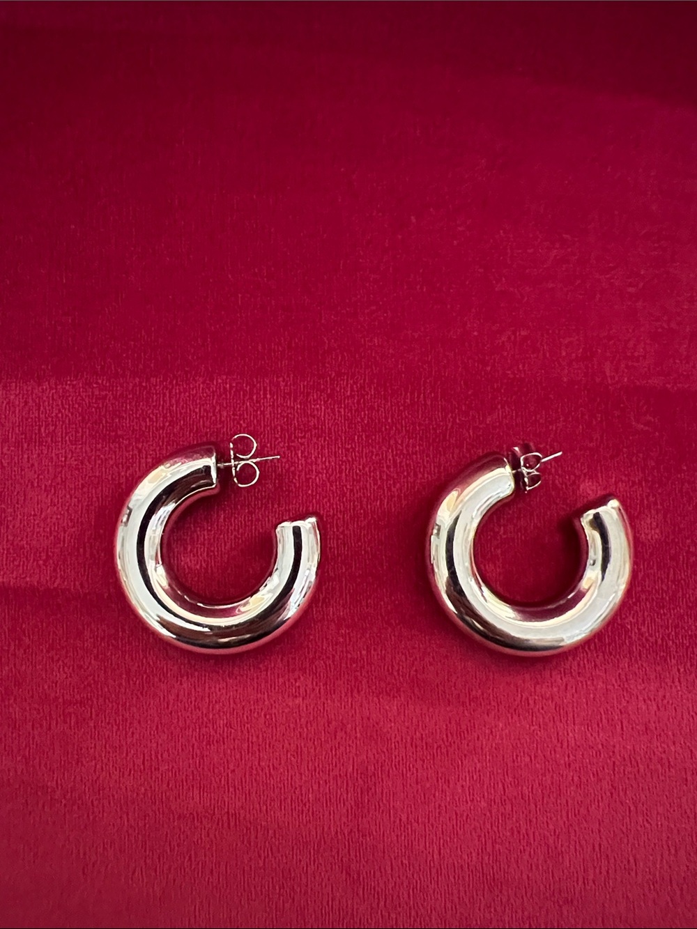 Janis Savitt- high polished rhodium plated brass hoop earrings